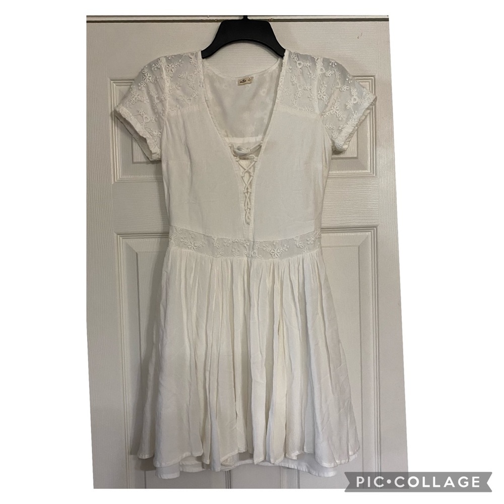 Hollister White A-Line Lace Up Dress is a size small.
